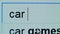 Person typing in browser search bar, looking for car rental, carpooling service