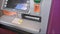 Person using atm cash machine automatic teller