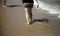 Person walking beach