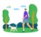 Person walking a dog in the park during daytime. Casual stroll with pet in natural setting. Leisure activity and pet