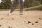 A person walking down a dirt road