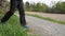 Person walking on gravel road