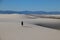 Person walking on white sand dunes, White Sands National Monument, New Mexico, USA