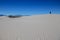 Person walking on white sand dunes, White Sands National Monument, New Mexico, USA