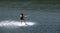 Person water-skiing on a lake in Niedersfeld, Germany