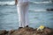 A person who is a fan of candomble on the beachfront paying homage to iemanja on Rio Vermelho beach in Salvador, Bahia