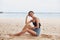 person woman beach sitting vacation sea nature smile travel sand freedom