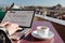 Person writing Blog on Laptop at Roof top Cafe