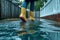 A person in yellow rain boots standing in a puddle