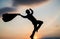 personal achievement goal. man silhouette jump on sky background. confident businessman running. daily motivation