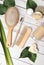 Personal care bamboo set of hairbrush, toothbrush, comb and shampoo bars. Sustainability and eco friendly accessories concept