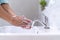 Personal hands wash with soap bubbles and rinse with clean water. Good health