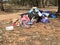 Personal household rubbish and waste illegally dumped in crown land bush