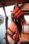 Personal life support flotation safety device life jacket, life vest, work vest, life saving, buoyancy aid or flotation suit for