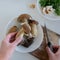 Personal perspective of woman hands preparing mushrooms Boletus edible for cooking them