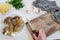 Personal perspective of woman hands preparing mushrooms Boletus edible for cooking them