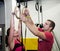 Personal Trainer giving fitness instruction at a Crossfit group class