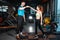 personal trainer high five with female client after workout in gym