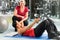 Personal trainer show abdominal exercise on mat