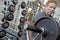 Personal trainer working biceps on a bench