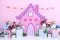 Personalized romantic decoration with colorful spring house and vases for first birthday