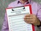 Personnel Action Packet Checklist sign on the page
