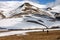 Persons Walking Tundra in Svalbard