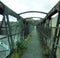 perspect old rusting railway footbridge