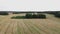 Perspective aerial view of a harvested agricultural field.