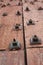 Perspective of ancient church door, adorned with large nails