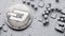 Perspective crypto-currencies: coins on a printed circuit board of gray color.