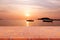 Perspective empty mon brick flooring clay brick on top over blur Longtail boats on seashore in summer background. can be used