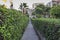 Perspective front shot of relaxing garden stone road between buildings in Izmir at Turkey