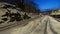 A perspective of the rails of a train station at dawn in northern Europe