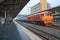 Perspective of Red orange train, Diesel locomotive