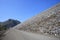 perspective of road to top of khao laem rock dam in kanchanaburi thailand