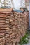 Perspective shot of ornage colored roof tile near masonry wall