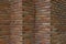 Perspective, side view of old red brick wall texture background