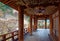 Perspective view of a beautiful garden through the corridor  Kairou  of a temple famous for cherry blossom trees