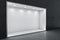 Perspective view on blank white niche with place for car or product presentation and glowing lamps on top in abstract empty hall