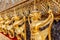 Perspective view of golden religious statue Statue Garuda in wat phra kaew temple, Bangkok, Thailand