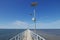 Perspective view of jetty with LED street light with solar cell on clear blue sky.