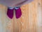 Perspective view of a kid`s feet with purple socks