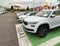 Perspective view of multiple cars on wide parking large space with Skoda Kodiaq