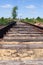 Perspective view of the old abandoned rusty railway tracks in deadlock.