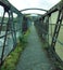 Perspective view of an old rusting railway footbridge in halifax