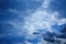 Perspective view of romantic navy blue sky with white grey clouds. Before the rain. High resolution artistic skyline background im