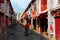 Perspective view of the Street of Happiness Rua da Felicidade flanked by traditional Chinese houses