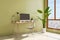 Perspective view on sunny natural colors work space in home office with modern computer on wooden table, green plants in white