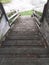 Perspective view of wooden stairs with steep incline. Detail of Caribbean and tropical architecture